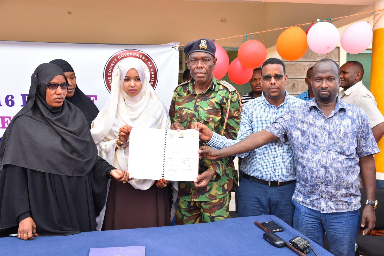 The signing of an MoU on gender-based violence at the Garissa Child Protection Unit
