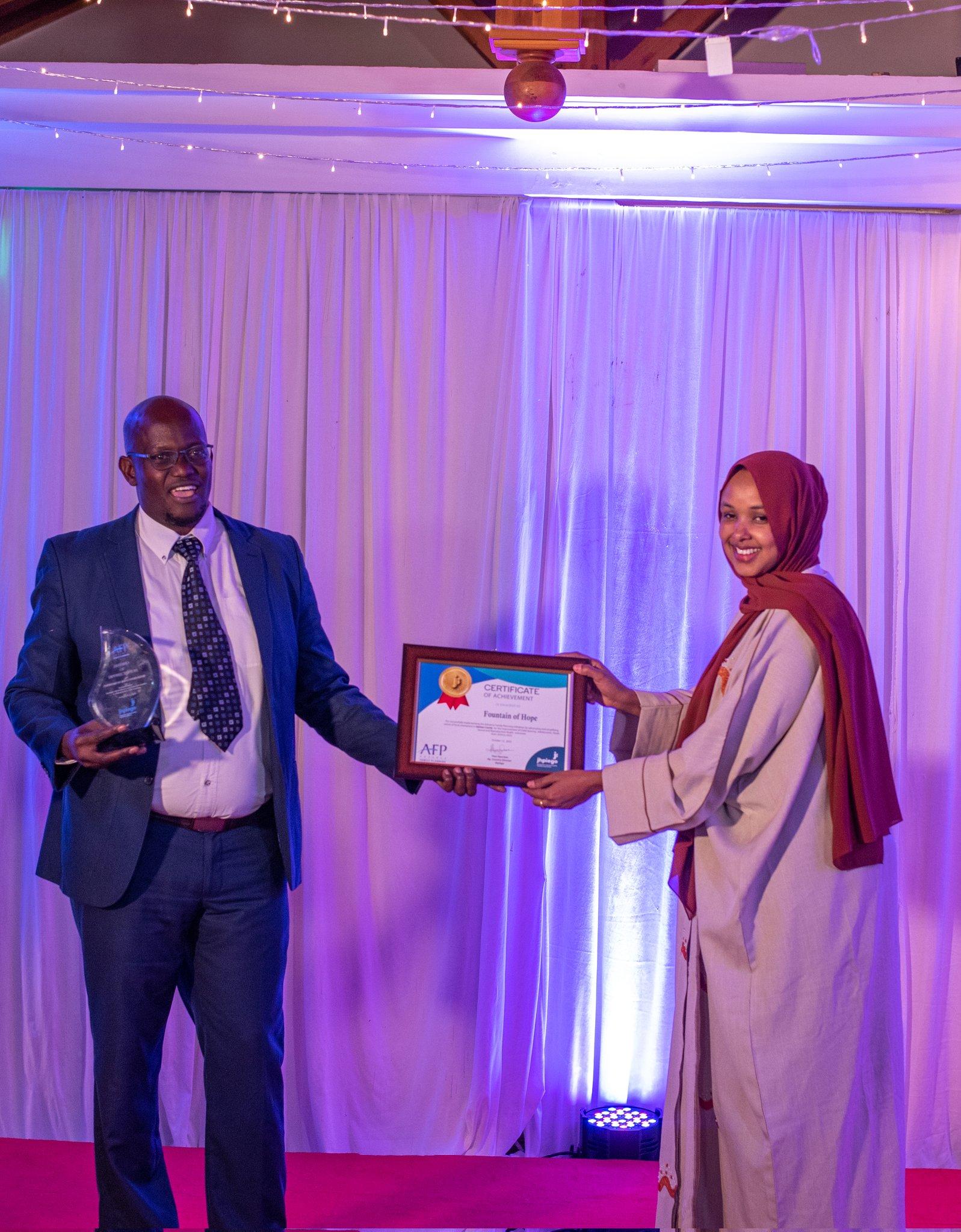 The award moment — the women of Garissa whose work it honors